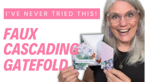 Woman smiling holding an open faux cascading gatefold card with violets and monarch butterflies, thumbnail reading 'I've never tried this! Faux cascading gatefold
