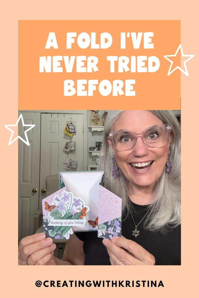 Woman smiling holding an open faux cascading gatefold card with violets and monarch butterflies, pin reading 'A fold I've never tried before