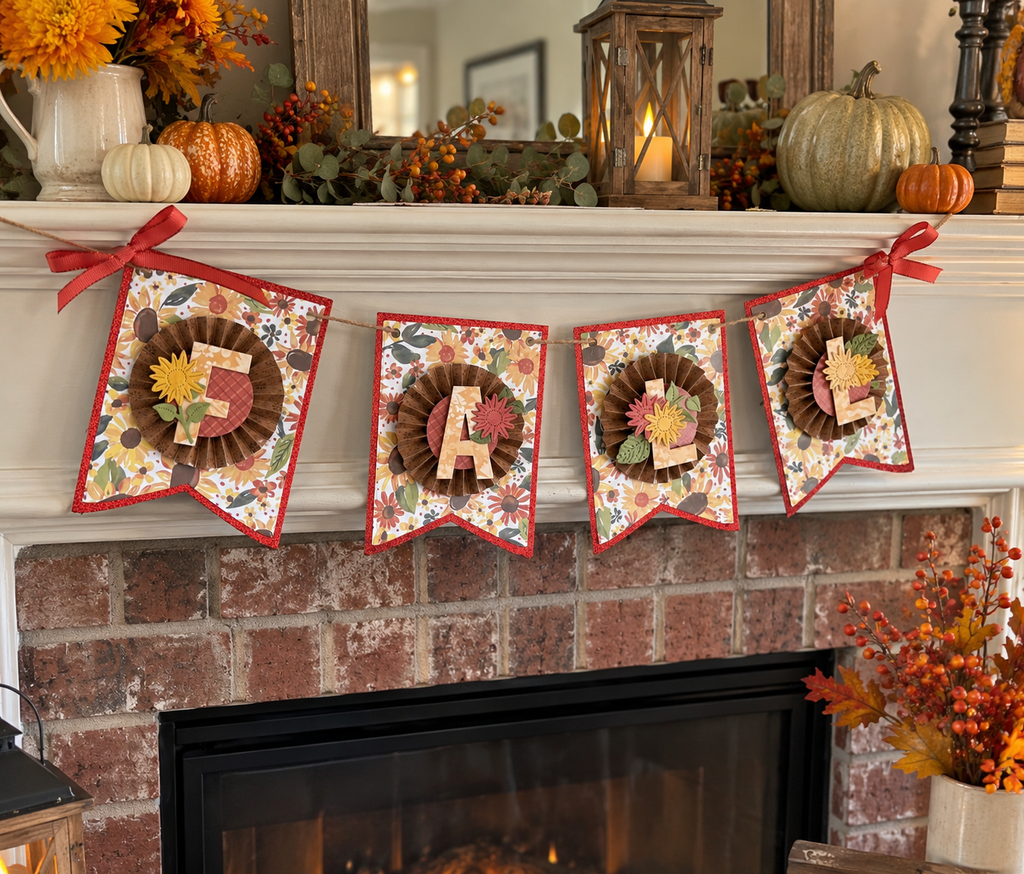 DIY Fall Paper Banner with paper rosettes and sunflower embellishments displayed on a warmly decorated fall fireplace mantel.